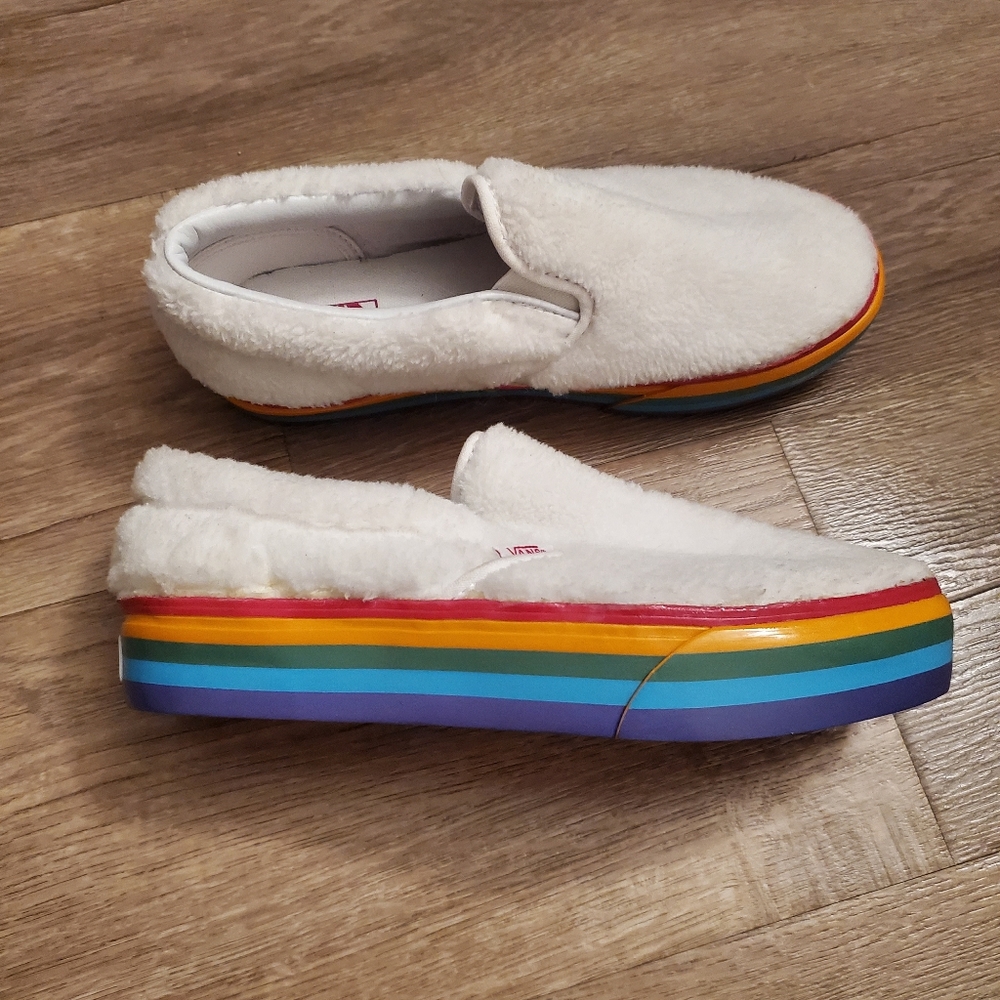 Vans white plush slip-ons with rainbow rubber